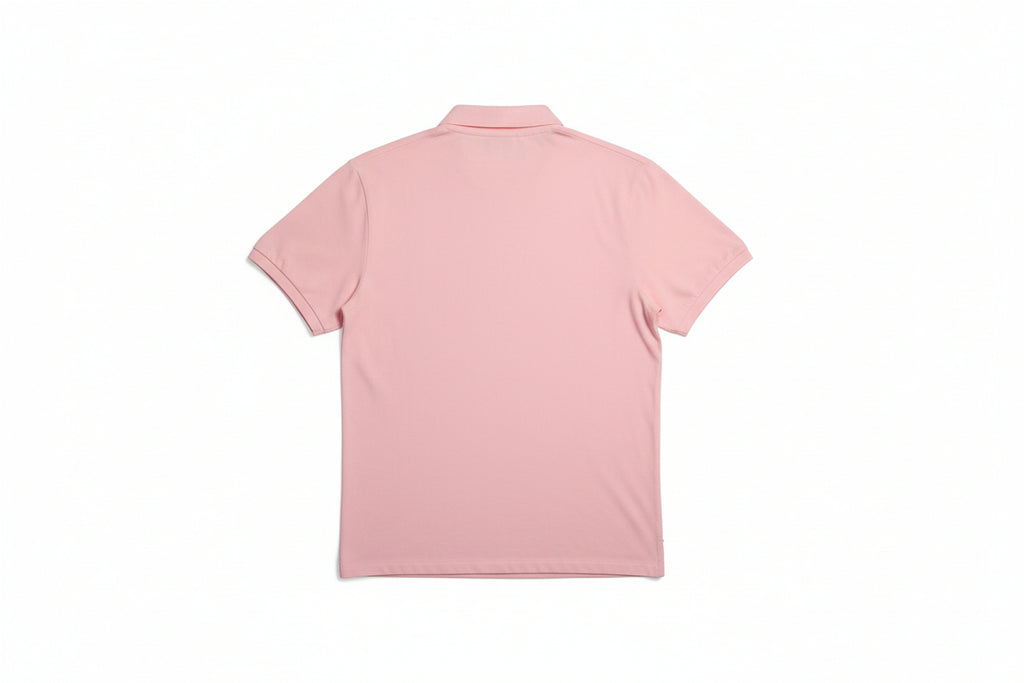 Pink shirt draped over a chair with a neutral background