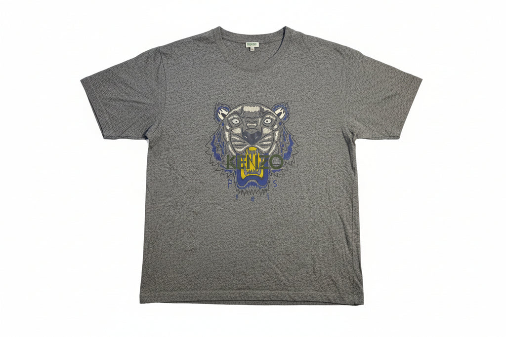 Folded gray t-shirt with a graphic design on a hanger against a neutral background
