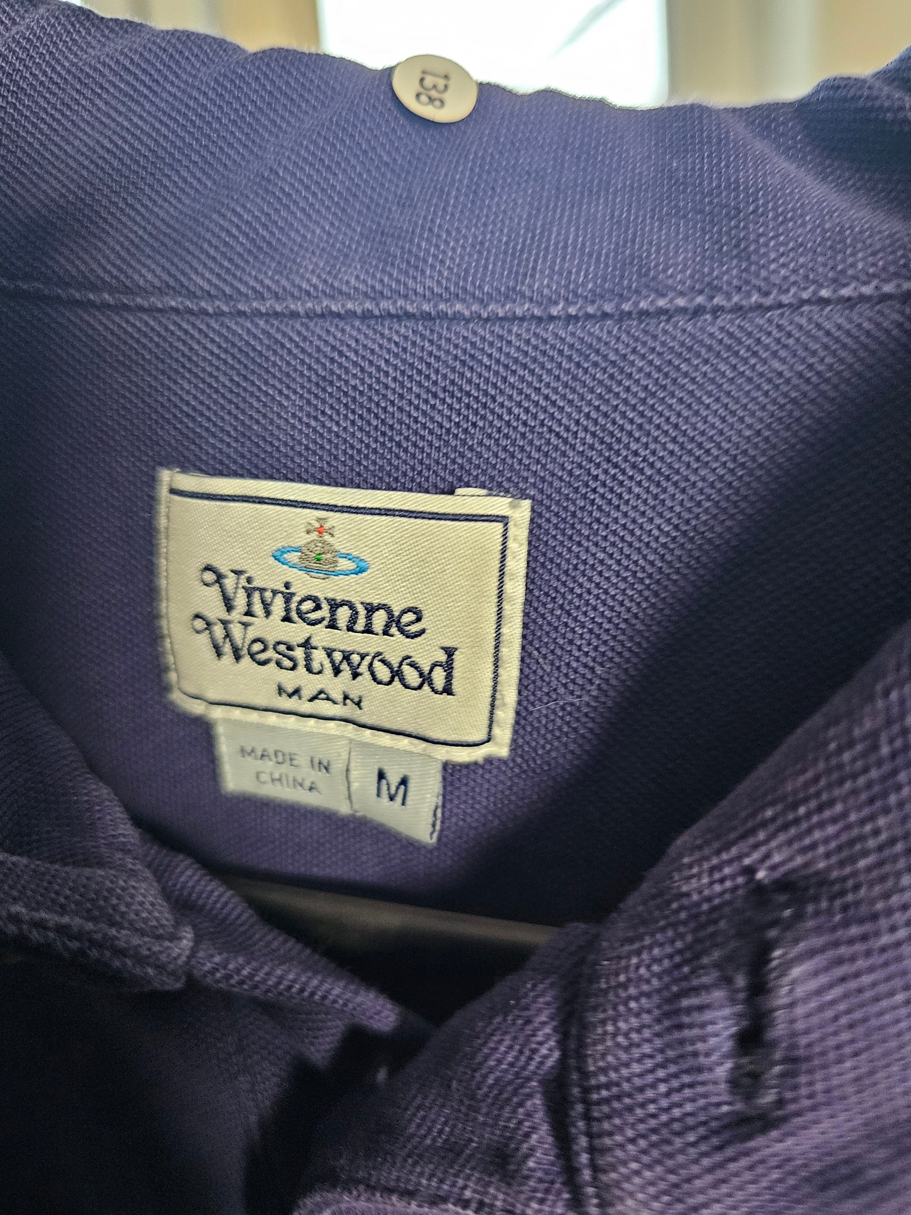 Vivienne Westwood label on a purple garment