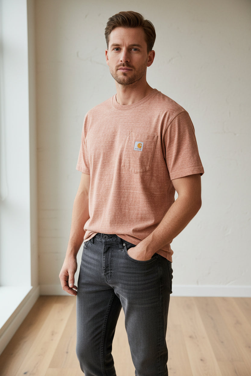 Brown shirt with a brand logo on a chair indoors