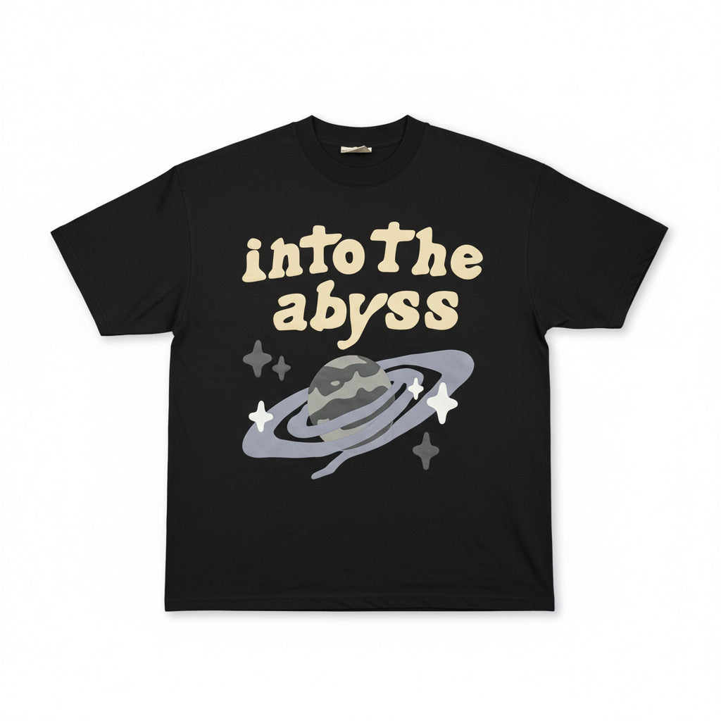 Black t-shirt with 'Into the Abyss' text and graphic on a hanger.