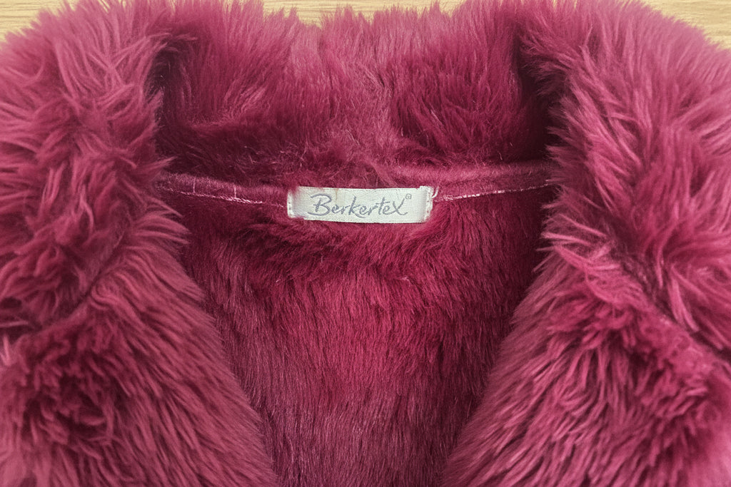 woman's Preowned Berkertex size 16 faux sheepskin Gillet