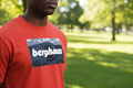 Red t-shirt with Berghaus logo on a gray background